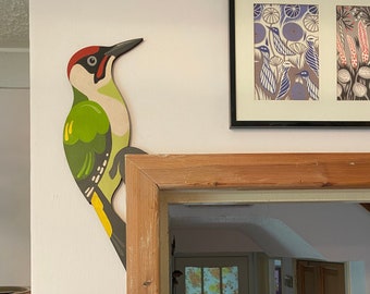 Hand painted green woodpecker to sit on a door frame