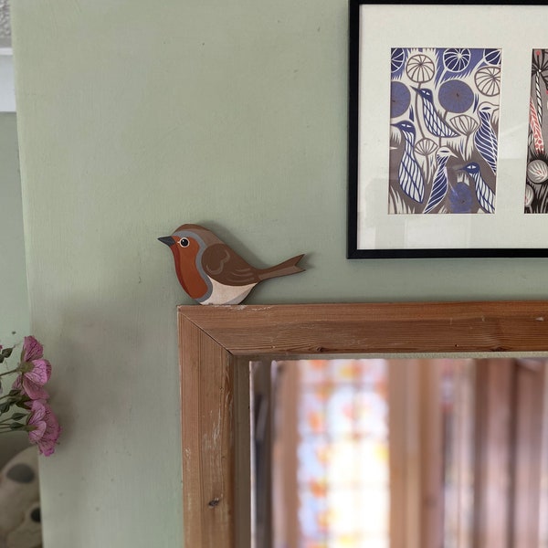 Hand painted robin for sitting on a door frame, picture rail, or similar