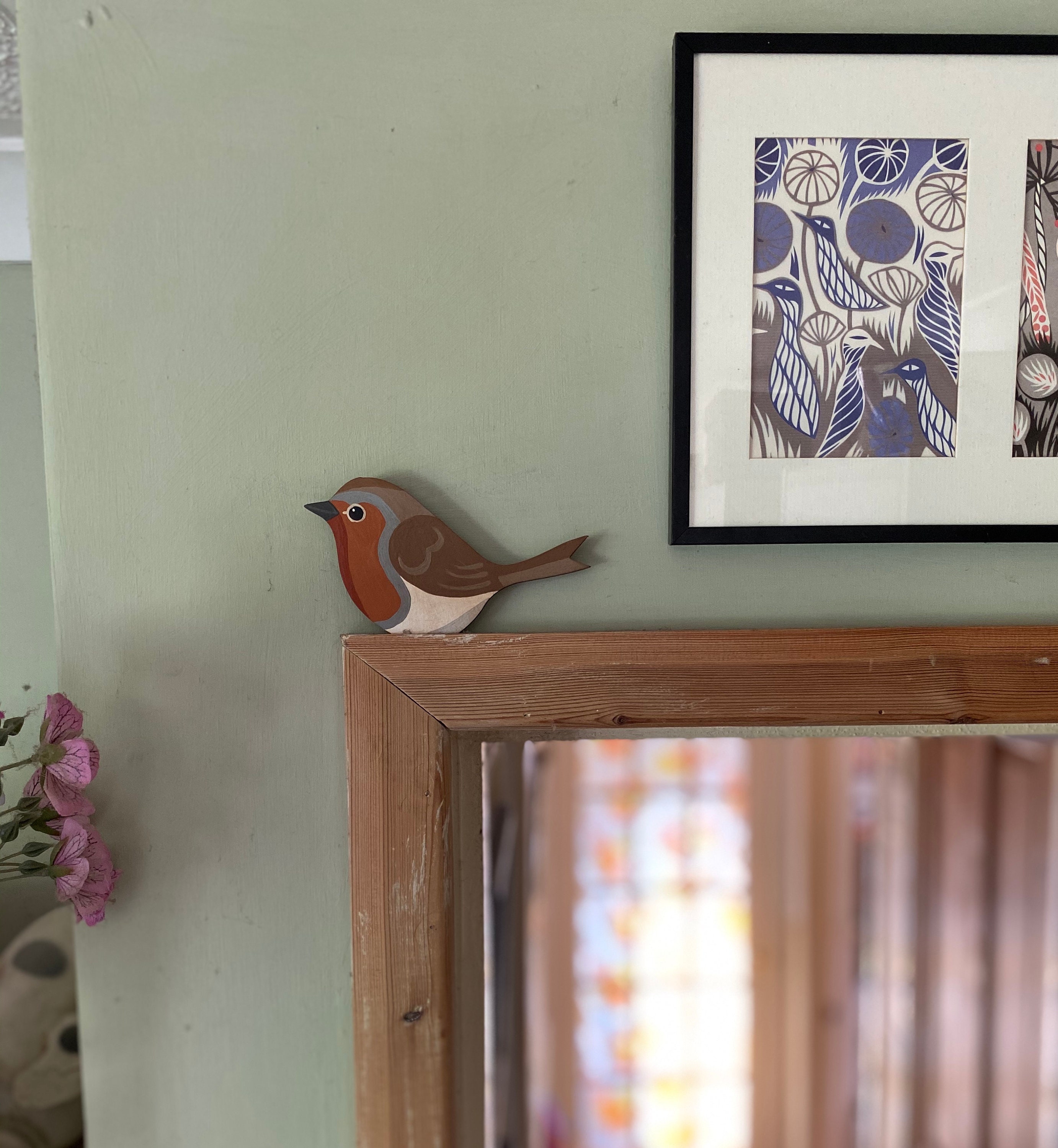 Hand painted robin for sitting on a door frame, picture rail, or similar