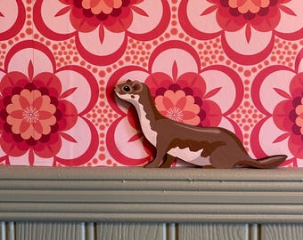 Hand painted weasel to sit on top of a door frame, picture rail, dado rail, skirting board etc.
