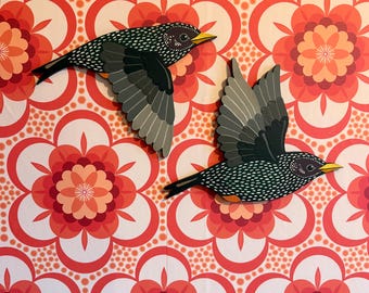 Hand painted flying starling (single bird) to hang on the wall.
