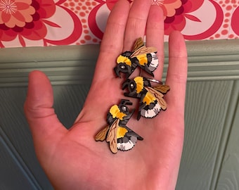 Miniature bee to sit on a door frame corner