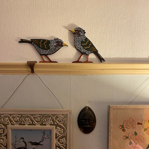 Pair of starlings to sit on a door frame, picture rail or similar.