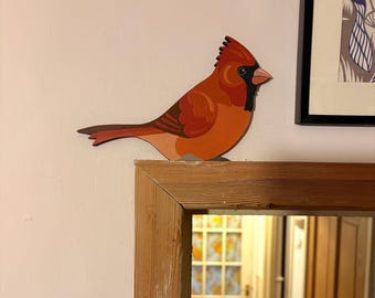Hand painted red cardinal to sit on a door frame, picture rail, picture frame etc