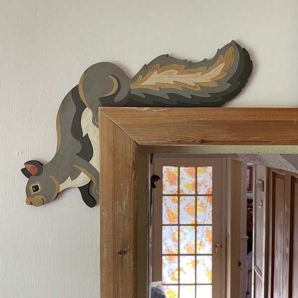 Hand painted grey squirrel to sit on a door frame corner