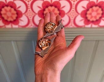 Hand painted miniature snail to sit on a door frame or similar