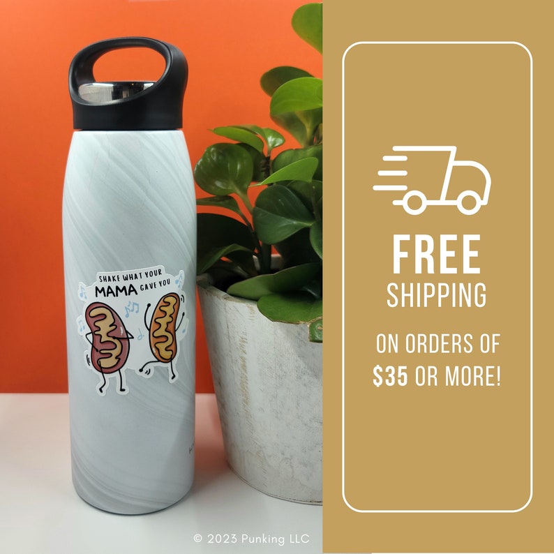 May include: White stainless steel water bottle with a black lid and handle. The bottle has a sticker with a cartoon illustration of two hot dogs dancing and the text "Shake what your mama gave you".