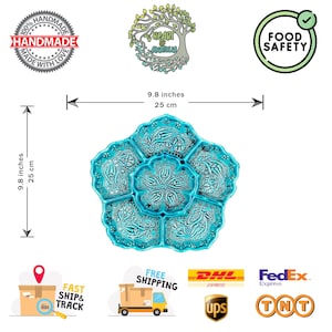 May include: A turquoise ceramic serving dish with a floral design, measuring 9.8 inches (25 cm) in diameter. The dish is divided into six sections and is labeled "Food Safety". The handmade dish is a decorative piece.