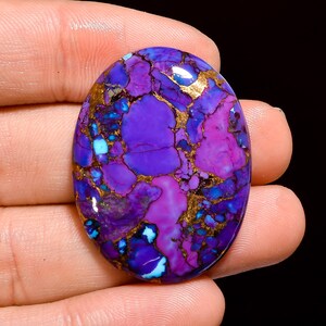 Purple Color Accented With Gold And Copper Tones December Birthstone 9132 Purple Copper Turquoise Cab Round 10mm Approximately 10 Carat