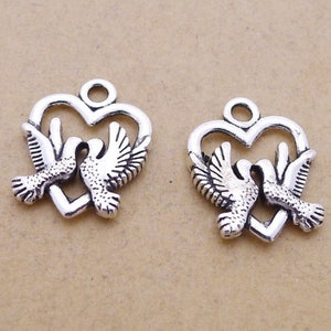 Silver Coloured Metal Love Bird Charms. Sold in Packs of 50. Silver Tone. Tibetan Charm.