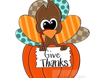 Puede incluir: Un pavo de dibujos animados con plumas marrones, ojos grandes y una lengua roja está sentado dentro de una calabaza naranja brillante. El pavo sostiene un cartel blanco que dice "Give Thanks".