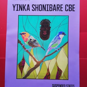 May include: A purple poster with the text "SERPENTINE" and "YINKA SHONIBARE CBE" in black. The poster features a colourful illustration of two birds perched on a branch with a black and red mask in the background. The text "SUSPENDED STATES" and "12 April - 1 September 2024" is at the bottom of the poster.