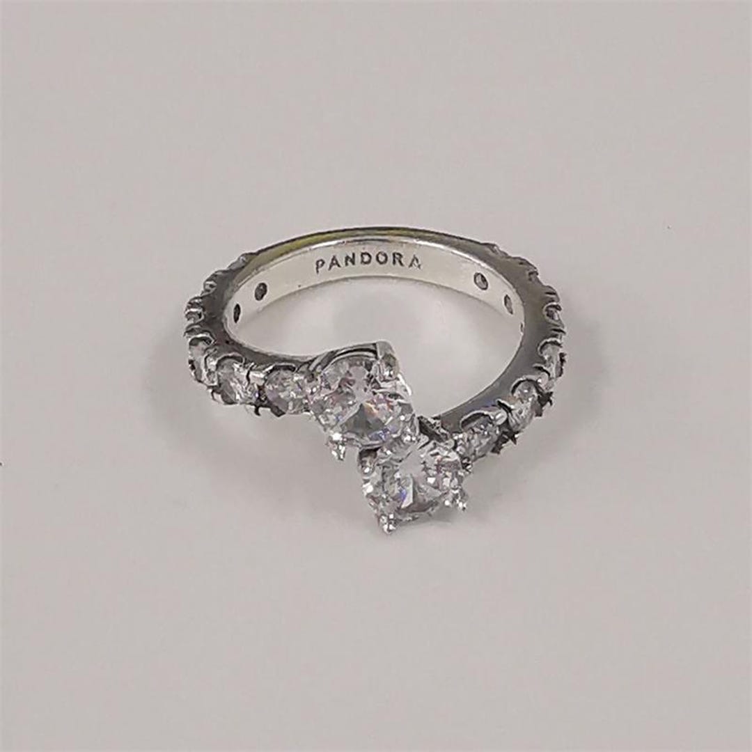 Buy Pandora Sparkling Overlapping Band Ring Online in India