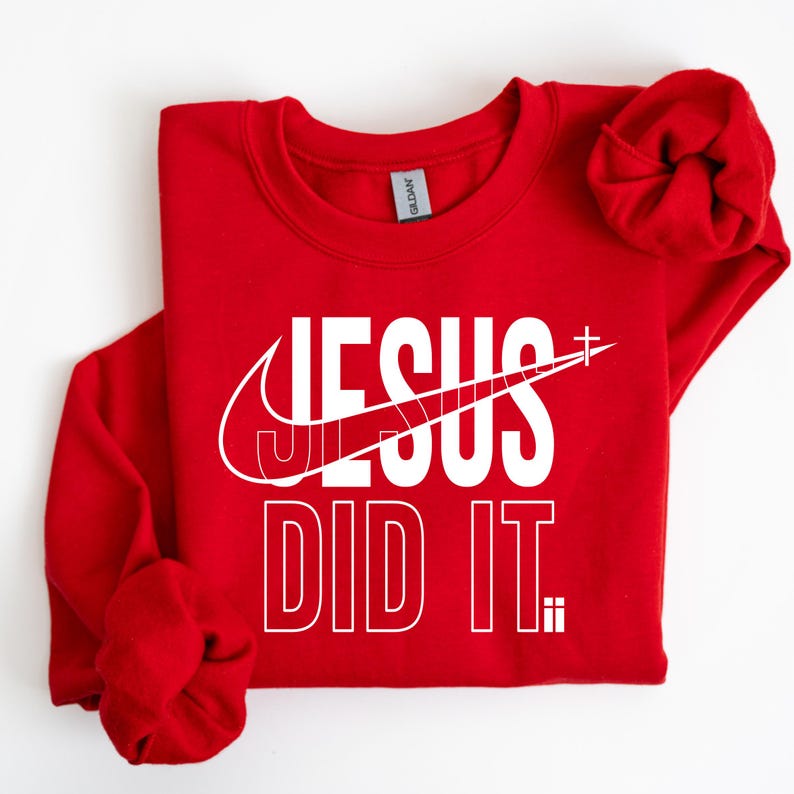 A red sweatshirt with the text "JESUS DID IT" printed on it.