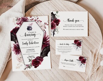 May include: A Halloween-themed baby shower invitation with a cauldron and bats. The invitation reads "A baby is brewing" and includes the name "Emily Robertson".
