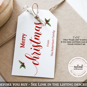 May include: A white gift tag with red text that says "Merry Christmas" and "From: The Robertson Family". The tag is decorated with a small green holly sprig with red berries. The tag is 2 inches by 3.5 inches and is an instant download.