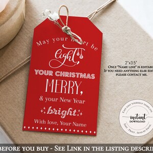May include: Red Christmas gift tag with white text that reads "May your heart be light, Your Christmas Merry, & your New Year ++bright++ With love, Your Name". The tag is 2" x 3.5" and is an instant download.