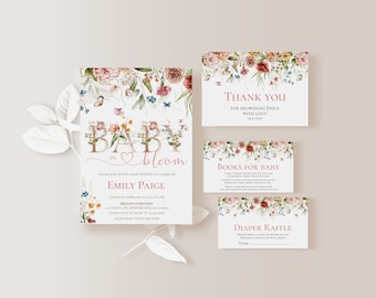 May include: A floral baby shower invitation featuring the text "Baby in Bloom" and the name "Emily Paige". The invitation is adorned with watercolour flowers and butterflies. The invitation includes the date, time, and location of the shower. There are also cards for "Books for Baby" and "Diaper Raffle".
