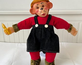 Vintage 14-Zoll-Plüsch-Puppe Affe mit Gummi-Gesicht und rotem Cord-Outfit - Einzigartiges Sammlerstück - Mid Century Schimpanse mit Banane
