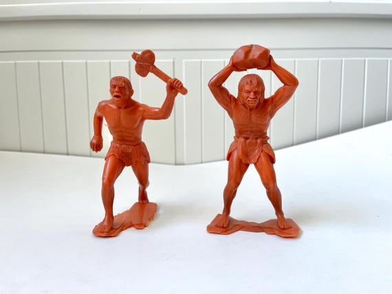 Set of 2 Vintage Louis Marx & Co. Caveman Figures – 1960s Orange