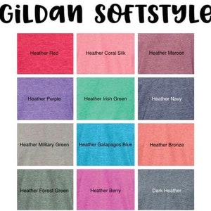 May include: A color chart showing 12 different heather colors for Gildan Softstyle t-shirts. The colors include Heather Red, Heather Coral Silk, Heather Maroon, Heather Purple, Heather Irish Green, Heather Navy, Heather Military Green, Heather Galapagos Blue, Heather Bronze, Heather Forest Green, Heather Berry, and Dark Heather.