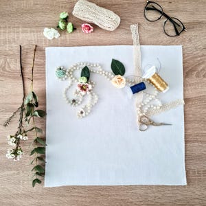 Platliggende linnen stylingmat: achtergrond voor bruilofts- en productfotografie, fotorekwisieten