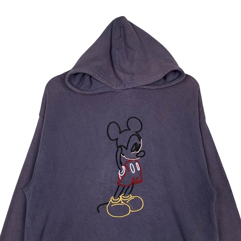 May include: A dark gray hooded sweatshirt with a black and red embroidered Mickey Mouse graphic on the front.