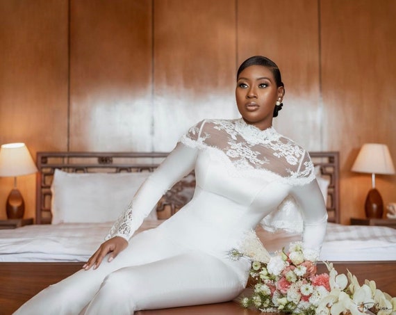 White bridal pantsuit shop with train