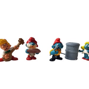 figurines Schleich Schtroumpf vintage (lot de 4) pompier, schtroumpfette, papa schtroumpf, peewit