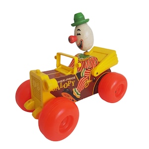 Vintage Fisher Price Jolly Jalopy pull-along toy (#724)