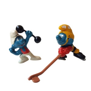 Vintage Schleich Peyo 20032 Hockey Smurf and 20020 Barbell Smurf