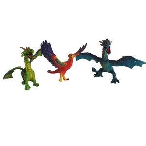 May include: Three toy dragons, one green, one red and orange, and one blue. The dragons are all in a flying pose with their wings spread out.