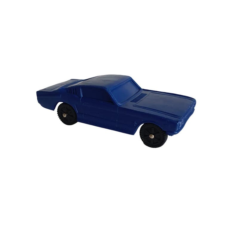 May include: A blue toy car with black wheels. The classic car has a sleek design with a low profile and a detailed front end. The toy car is a miniature replica of a vintage vehicle.