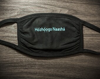 I walk in Beauty - Black cotton face mask - Navajo (Dine) phrase "Hozhoogo Naasha"