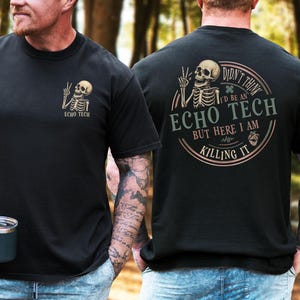 May include: Black t-shirt with a skeleton graphic giving a peace sign. The text "ECHO TECH" is printed below the skeleton on the front. The back of the shirt features a circular design with the text "DIDN'T THINK I'D BE AN ECHO TECH BUT HERE I AM KILLING IT".