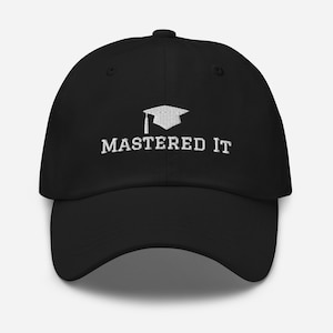 May include: Black baseball cap with white embroidery that says "MASTERED IT" and a graduation cap icon.