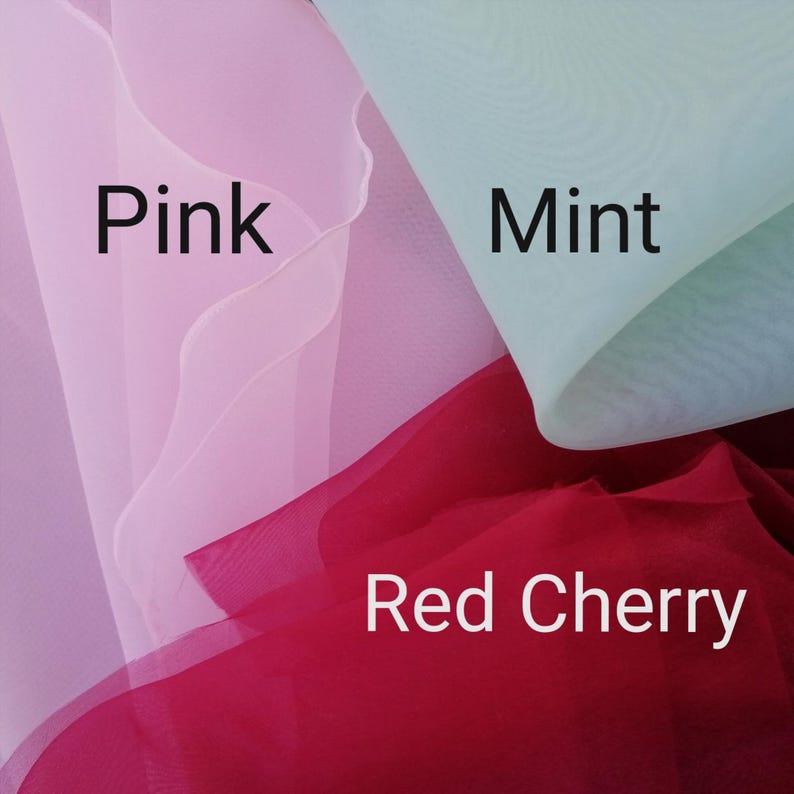 May include: Close-up of three fabric swatches in pink, mint green, and red cherry. The word "Pink" is written in black text on the pink fabric. The word "Mint" is written in black text on the mint green fabric. The word "Red Cherry" is written in black text on the red cherry fabric.