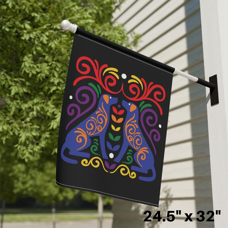 May include: A black flag with two blue dogs facing each other. The dogs are surrounded by colorful swirls and a rainbow pattern. The flag measures 24.5 inches by 32 inches.