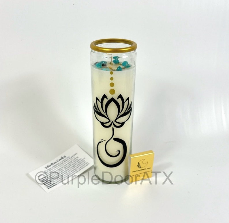 A set of eight glass candles with mystical designs on front and crystals on top.