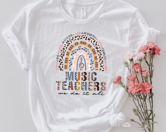 Muziekleraren - UNISEX T-shirt met korte mouw, grafisch T-shirt, waardering leraar, geef muziek cadeau, inspirerende leraar, "We Do It All"