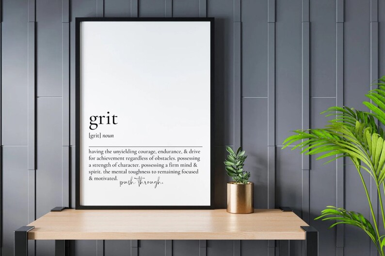 May include: Black and white printable wall art with the definition of the word "grit" in a minimalist style. The definition is: "having the unyielding courage, endurance, & drive for achievement regardless of obstacles, possessing a strength of character, possessing a firm mind & spirit, the mental toughness to remaining focused & motivated. push through."