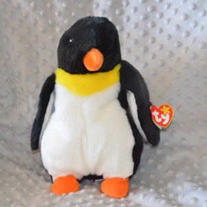 Vintage Ty Beanie Buddy "Waddle" the Penguin with tags. New. Retired. Black, yellow, orange and white plush.