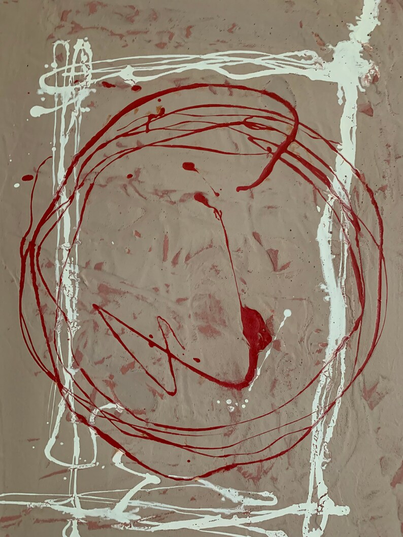 Puede incluir: Pintura abstracta con salpicaduras y l&iacute;neas de pintura roja y blanca sobre un fondo beige. La pintura roja forma un c&iacute;rculo en el centro del lienzo.