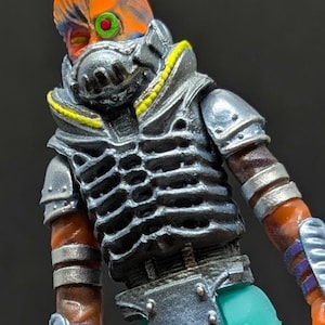 Scraplord (painted) by Tiddy Bean Toys. Hand molded and cast. 2 points of articulation, removable head