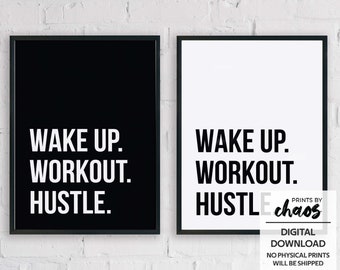 Puede incluir: Dos impresiones enmarcadas en negro con texto blanco sobre una pared de ladrillo blanco. El texto en las impresiones dice "Wake Up. Workout. Hustle." y "Wake Up. Workout. Hustle. Prints by Chaos. Digital Download. No physical prints will be shipped."