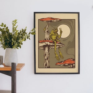 Frog and toad sitting on mushrooms in forest. Great for psychonauts home decor. Trippy experience art for alvarius.