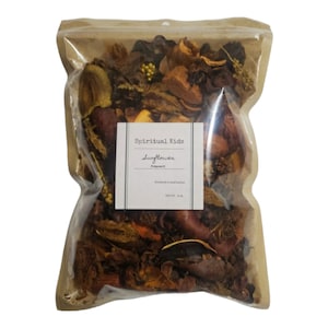 May include: A clear plastic bag filled with brown, orange, and yellow potpourri. The bag has a label that reads "Spiritual Kids" and "Sunflowers" with the word "Potpourri" underneath.