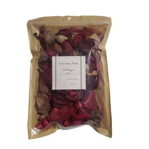 May include: A brown paper bag with a clear plastic window, containing red and brown potpourri. The bag has a label that reads "Spiritual Kids Fall Magic Potpourri".