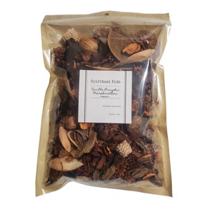 May include: A brown paper bag with a zipper closure filled with potpourri. The bag has a label that reads "Spiritual Kids Vanilla Pumpkin Marshmallow Potpourri".