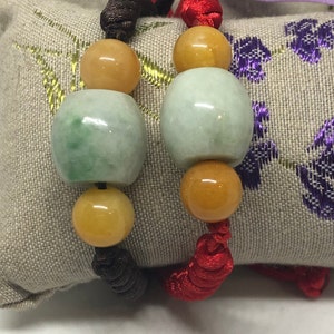 Natural Grade A Very Light Green w/ Specks of Dark Green and Yellow Jade Adjustable Red/Brown String Bracelet
